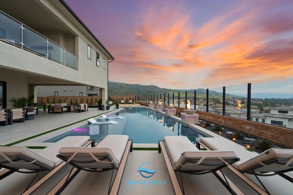 How do elevation changes impact pool design and cost_