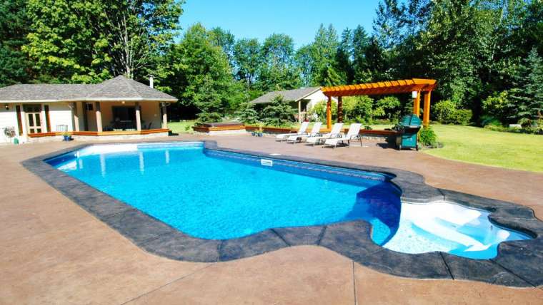 How do I prepare my backyard before pool construction starts